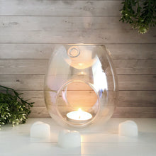 Load image into Gallery viewer, This elegant wax melt burner is the perfect addition to any modern home. Made from glass, each piece is handblown and designed to release fragrance throughout your home at the ideal temperature to produce the optimum scent throw.
