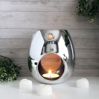 This elegant wax melt burner is the perfect addition to any modern home. Made from glass, each piece is handblown and designed to release fragrance throughout your home at the ideal temperature to produce the optimum scent throw.